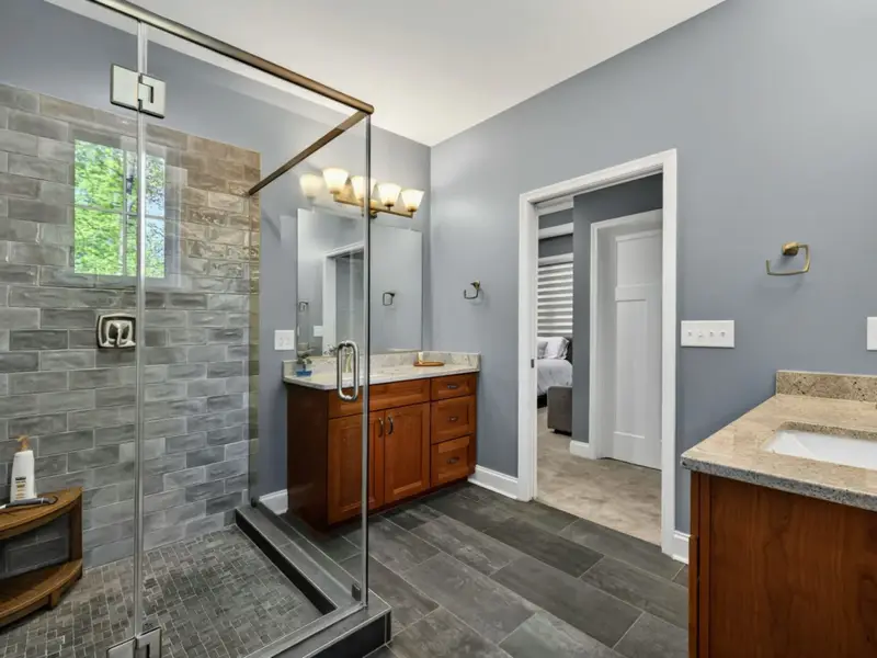 Suite 1 - View toward the bath and walk-in storage from the bed.