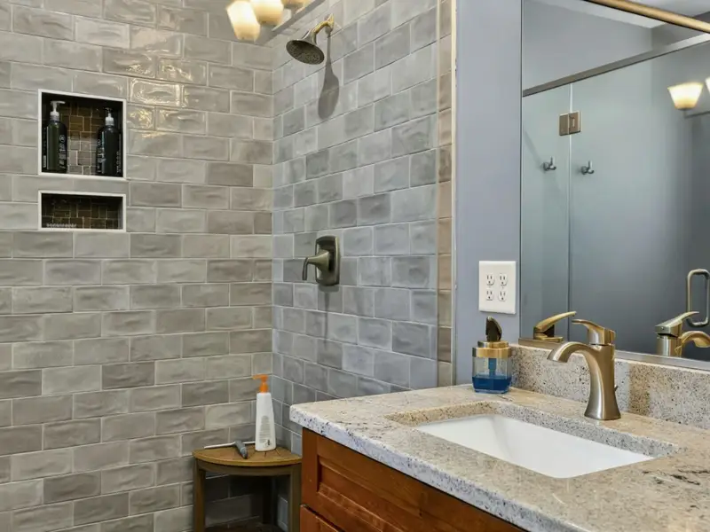Suite 1 Bath - Bright, airy bath with a window for natural light.