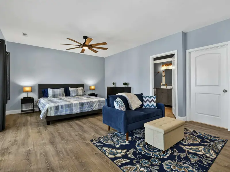 Suite 2 - Lower-level king bedroom with private walkout and ensuite bath.