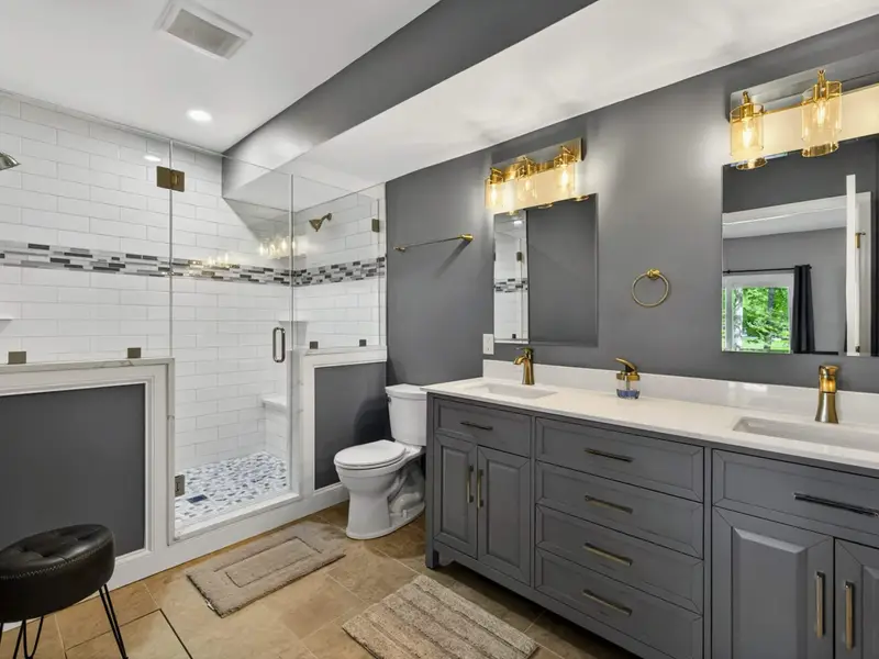 Suite 2 - Light blue walls keep the space calm and lake-inspired.