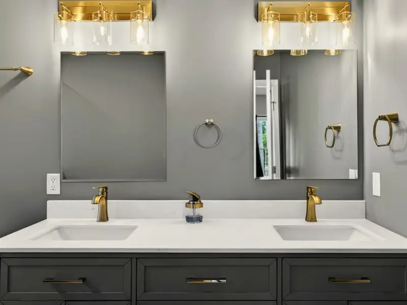 Suite 2 Bath - Walk-in tile shower with single vanity in the ensuite.