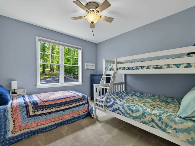 Bedroom 4 - Bunk room with twin-over-full bunk and an additional twin bed (sleeps 4).