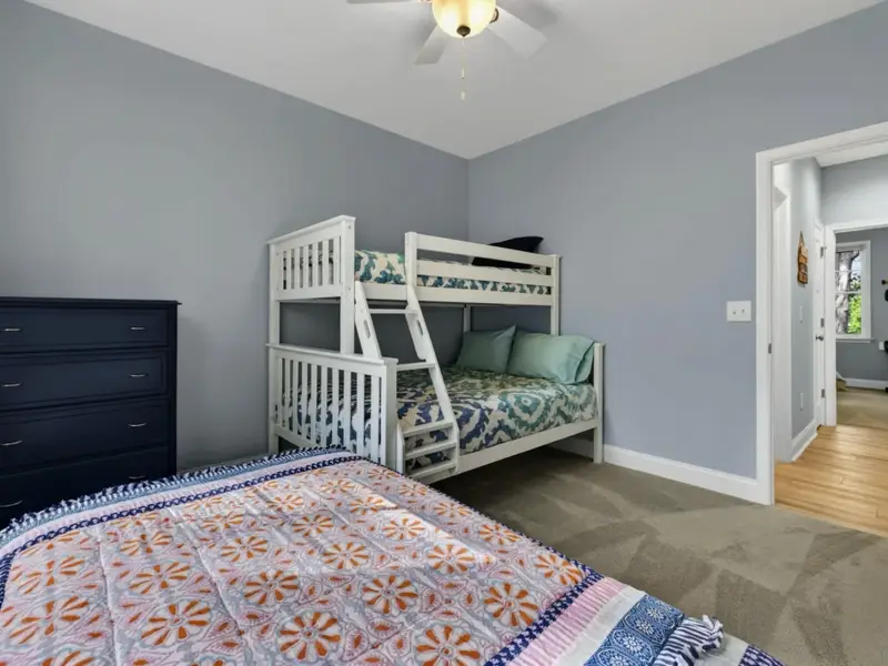 Bedroom 4 - Twin bed with custom quilts and a bunk that sleeps three.