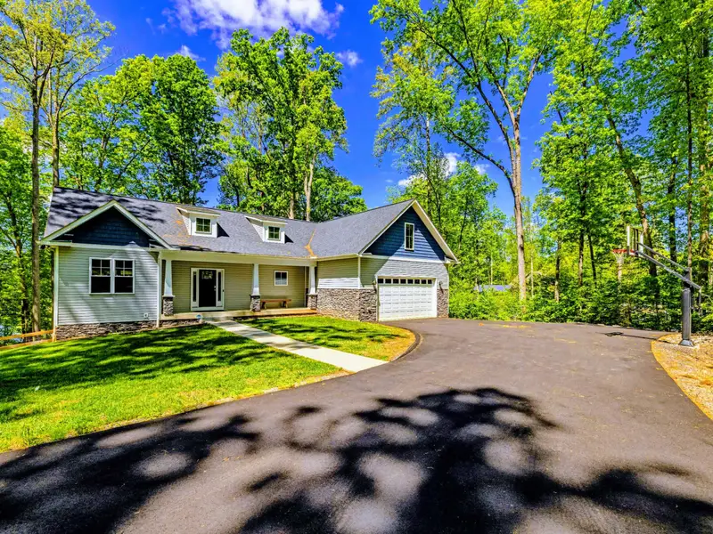 Exterior - Dormer windows and crisp white trim give the home great curb appeal.