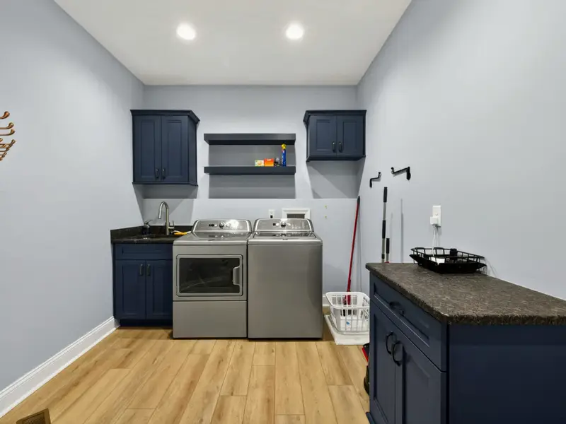 Laundry - Full-size washer and dryer on the main level for easy access.
