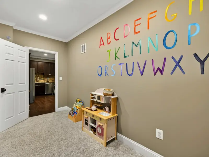 Children's Playroom - Just off the main kitchen, with a play kitchen of its own, so the cooks of both ages can be in the same place at once.