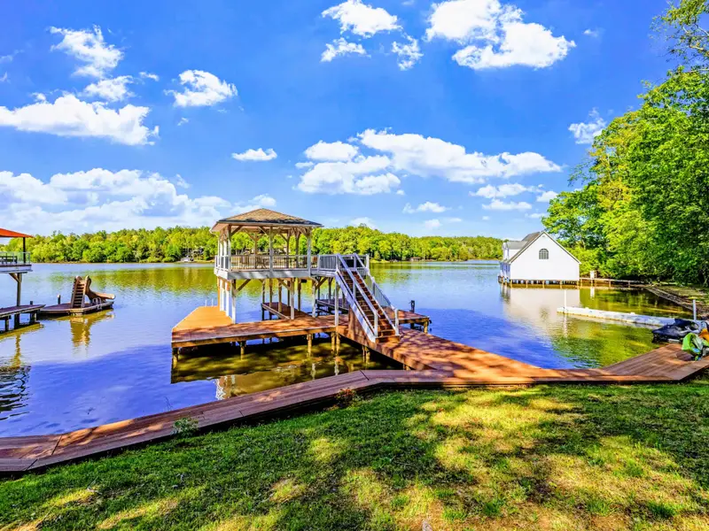 Waterfront - The shore drops gently into clear water, ideal for swimming and easy boat access.