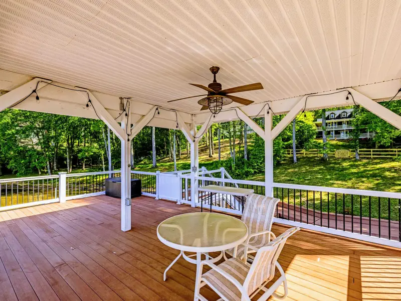 Dock - The full upper deck under the gazebo roof, room for the whole group at the rail.