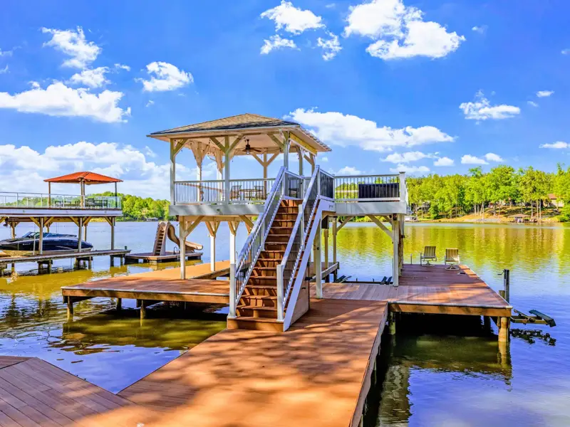 Dock - The signature two-story dock with covered gazebo deck above and two boat slips below.