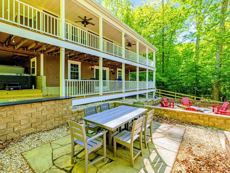 Patio - Hot tub, dining, and fireside chats are within steps of each other.