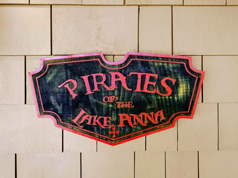 Lower Porch - The 'Pirates of Lake Anna' sign sets the tone for the lower covered porch.