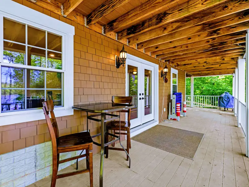 Lower Porch - Grab a seat under the covered porch, shaded and lake-facing.