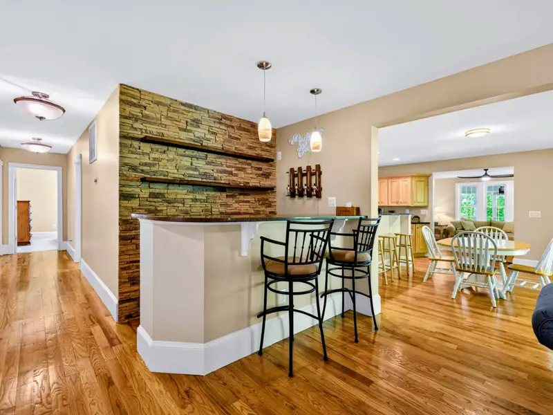 Wet Bar - The custom stacked-stone wet bar is a property signature, perfect for craft cocktails before dinner.