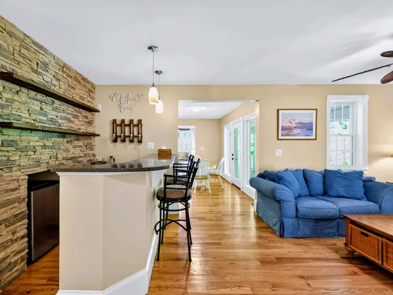 Wet Bar - Pull up a stool at the rock wet bar, the centerpiece of the entire main floor.