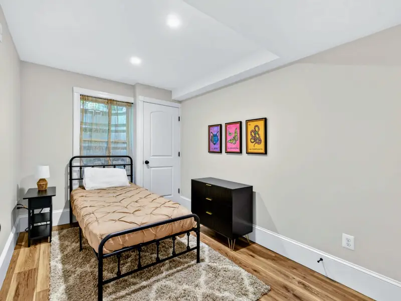 Twin Bedroom - A single bed in a quiet lower-level room, ready for kids or the extra guest who needs their own space.