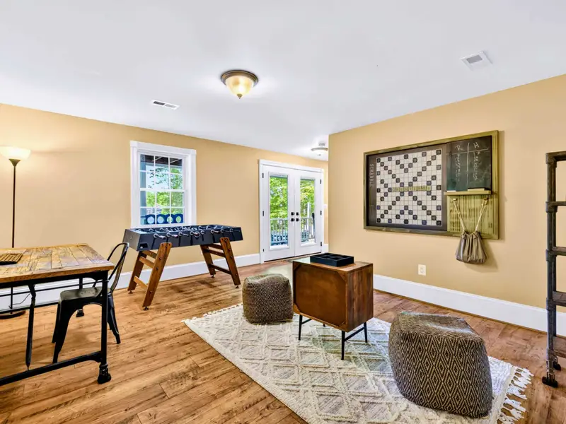 Game Room - The whole basement opens up into one big play space for kids and adults alike.