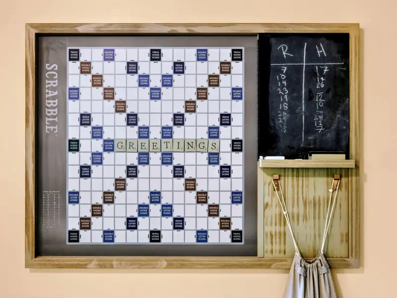 Game Room - Oversized wall-mounted Scrabble for friendly competition.