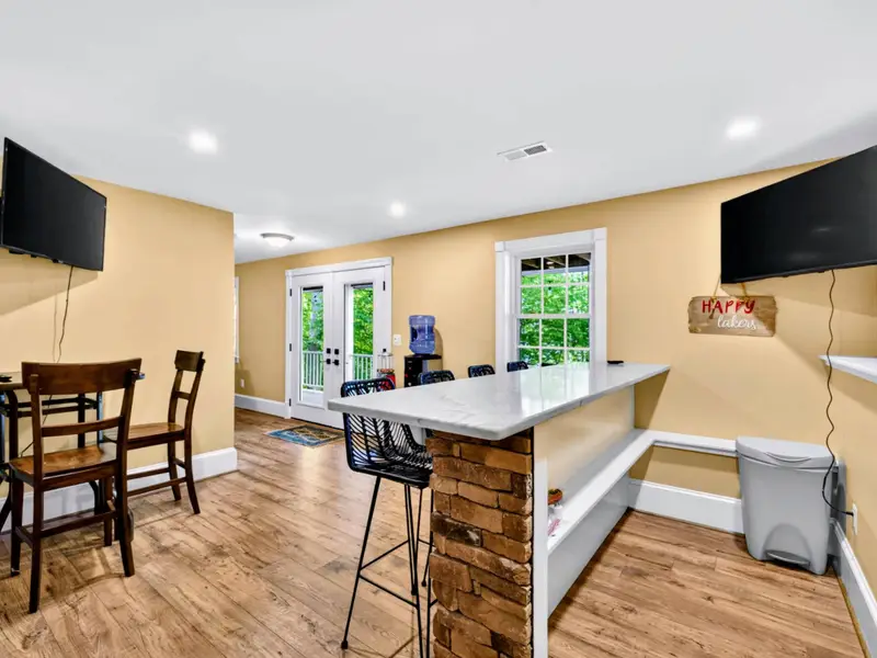 Game Room - Pull up a stool and watch the action from the bar, or jump in when it's your turn.