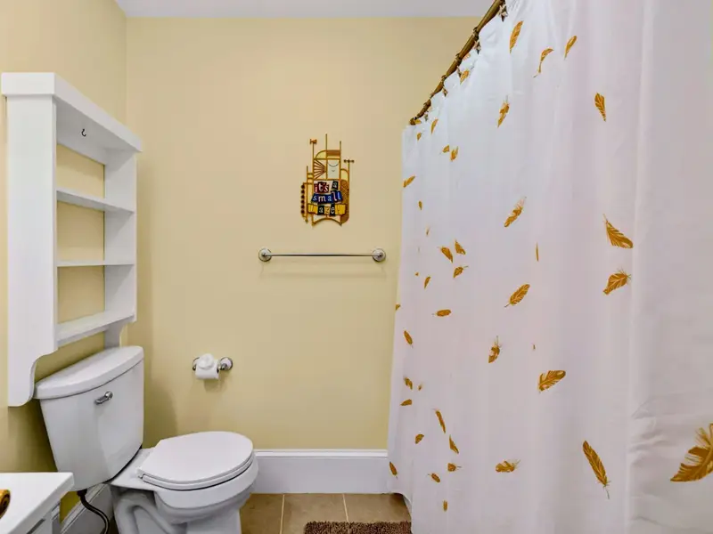 Hall Bath - A classic tub/shower combo that makes bath time easy for little ones.