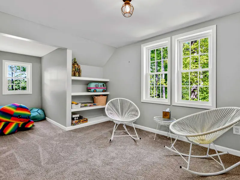 Bonus Room - Kid-friendly bookshelves and a play corner make the upper level its own little world.