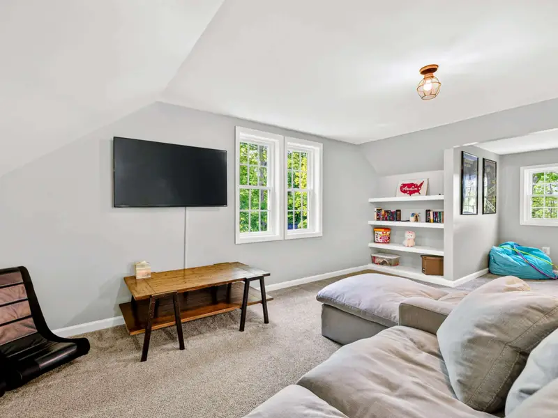Bonus Room - Vaulted ceilings and angled walls give the upper-level retreat real character.