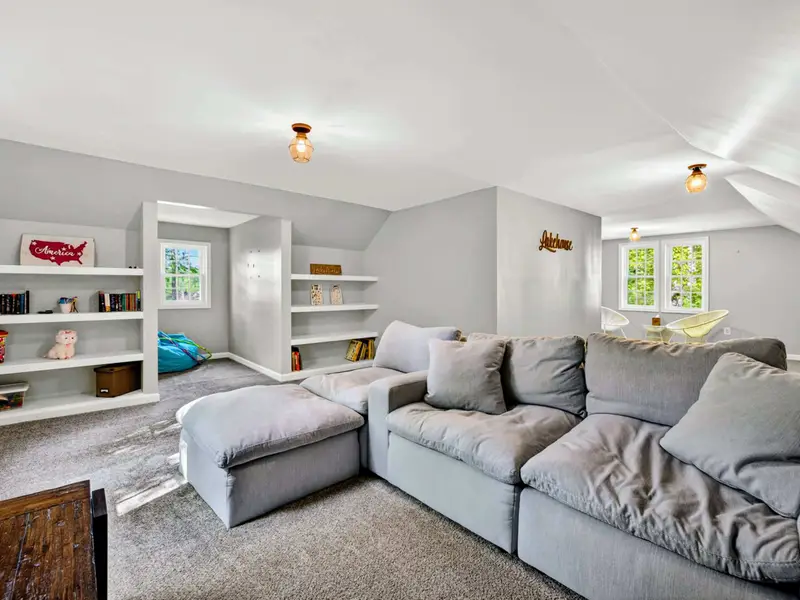 Bonus Room - Comfortable seating, plenty of natural light, and a layout that handles a full crew.