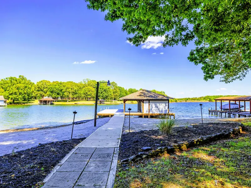 Boat Dock - Side view of the covered boat dock with two slips, ready for whatever you bring to the lake.