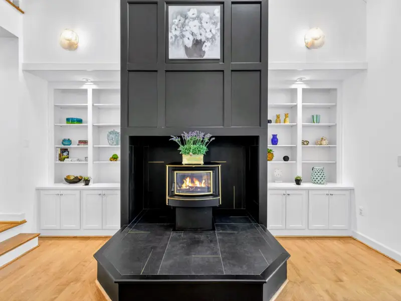 Great Room - Built-in shelving and styled cabinetry off the main living space.