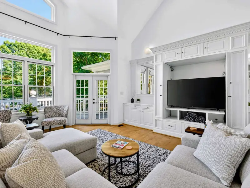 Great Room - The TV on its stand gives the room a clear movie-night focal point on rainy days.