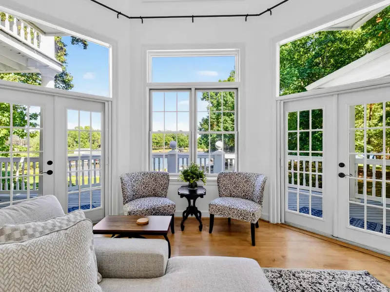 Sunroom - Bay-window sitting area with French doors out to the back deck.