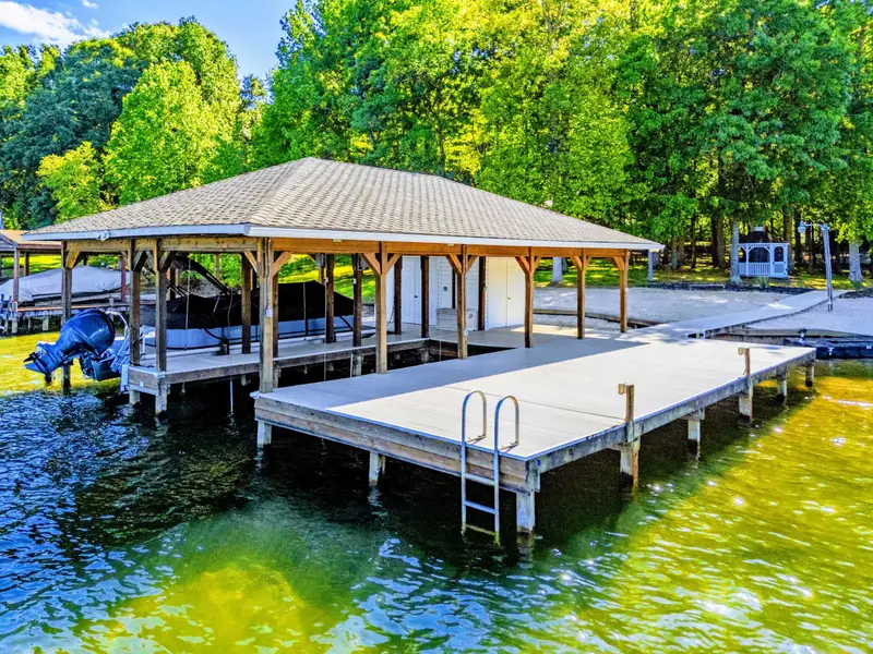 Boat Dock - Open-air gazebo at the end of the dock for shaded gatherings right over the water.