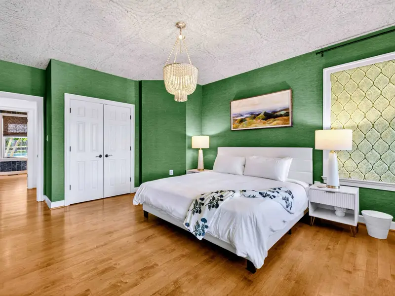 King Bedroom - View toward the closet and door from the foot of the bed.