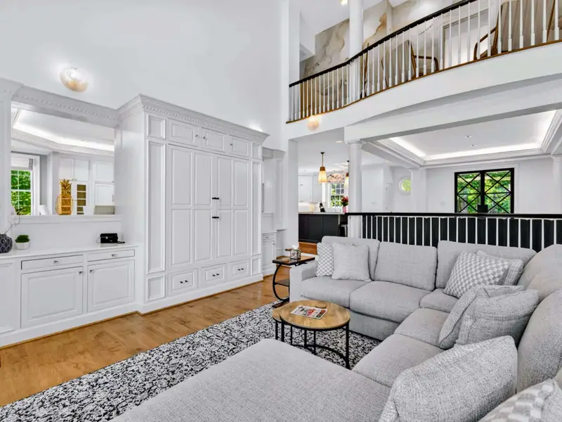 Great Room - Long sectional and curated decor keep the focus on the lake views.