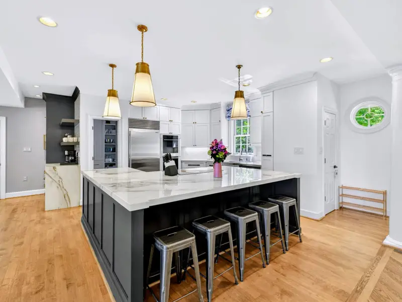 Kitchen - The chef's kitchen flows directly into the great room for an easy open floor plan.
