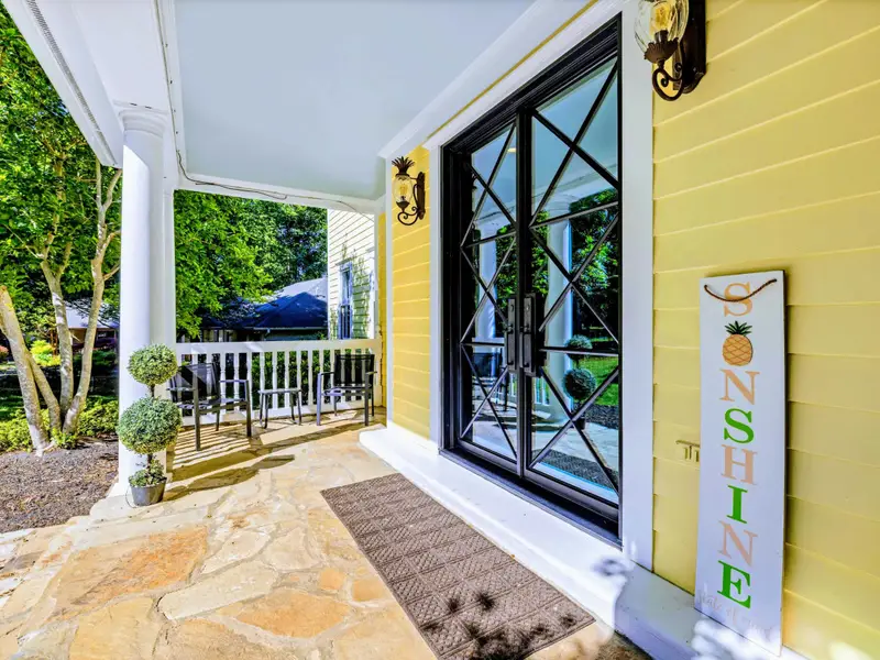 Front Entry - The covered front porch sets a calm tone before you step inside.