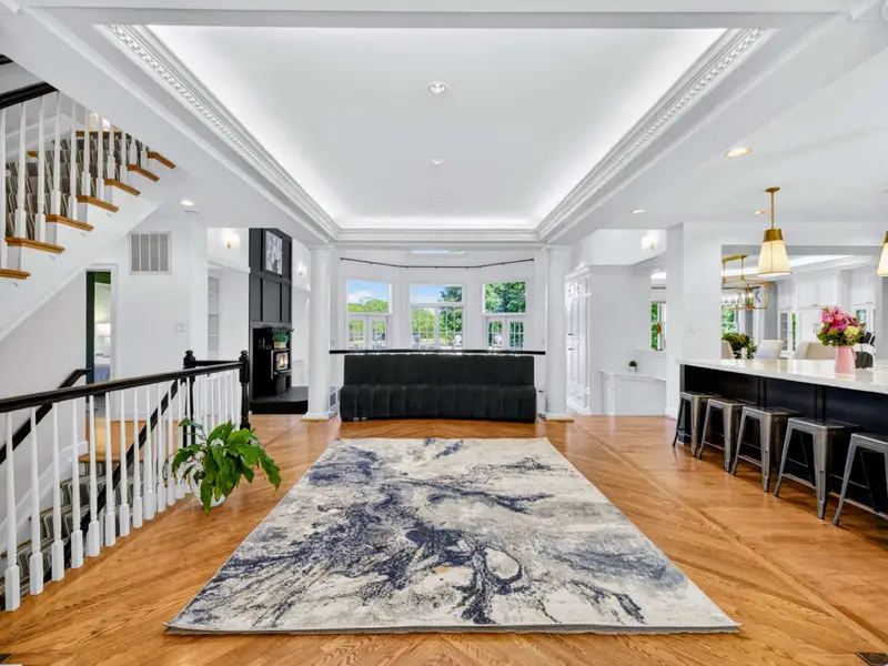 Great Room - Open layout flows from the kitchen island into the main living and dining space.