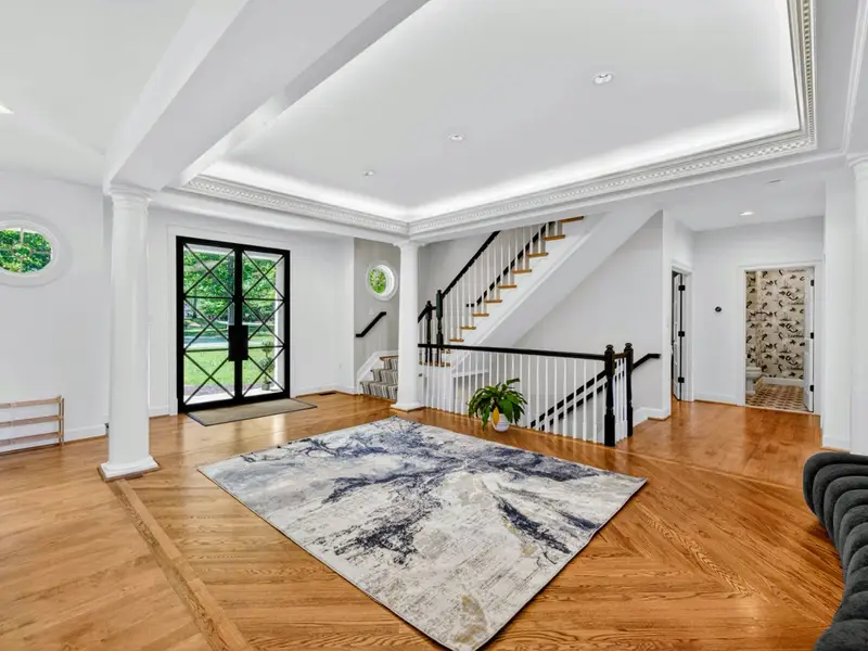 Great Room - Hardwood floors and a vaulted ceiling make the whole main level feel open and bright.