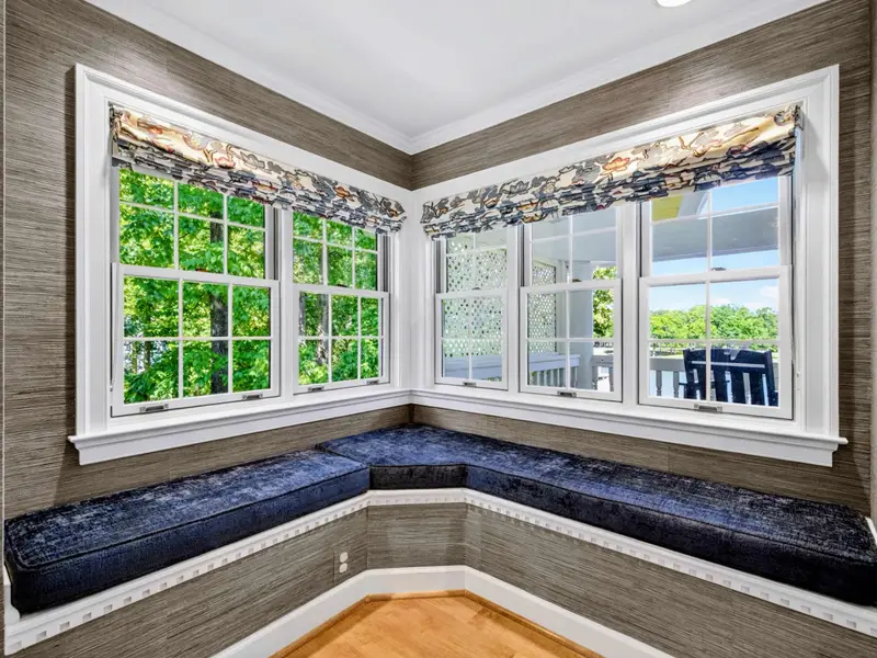 Primary Suite - Window seat alcove off the primary bedroom, with a view to the lake.