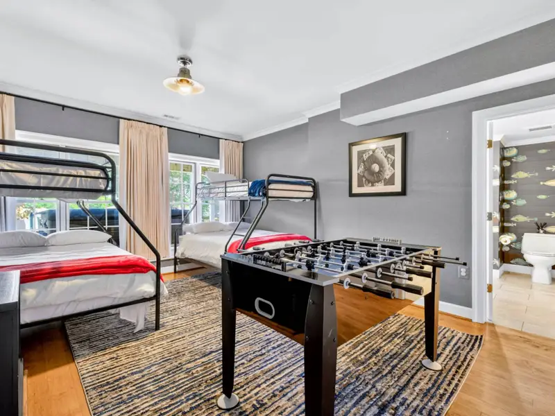 Bunk Room - Twin-over-full bunks sleep four, with a foosball table tucked into the room.