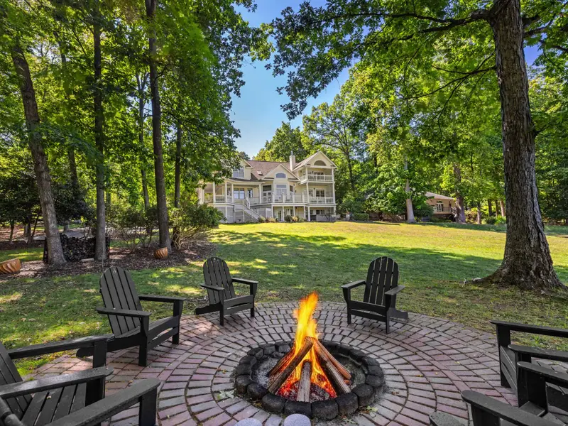Fire Pit - Paver patio fire pit set among the trees, a quiet spot for evening conversation.