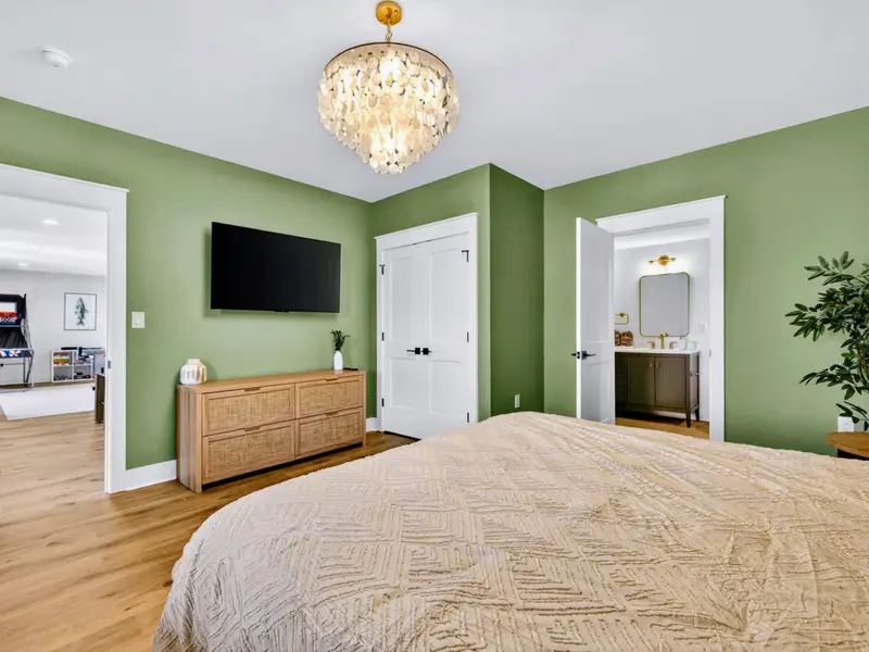 Lower King Suite - The king suite opens right to the game room and its own ensuite bath, private yet steps from the fun.