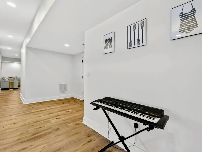 Music Corner - A keyboard waits in the hall between the game room and media lounge, set for an impromptu song any time.