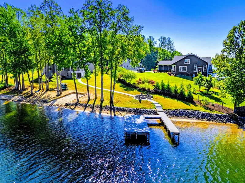 Dock from Above - Private dock with easy water access for swimming, paddling, or pulling up the boat for the day.