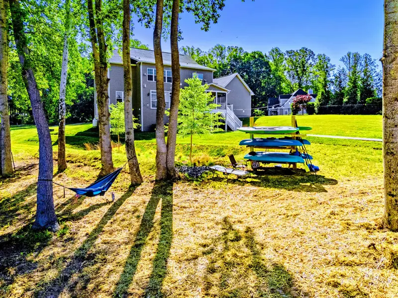 Lakeside Lawn - Picnic tables under the trees and a hammock for the afternoon, with the lake a short walk away.