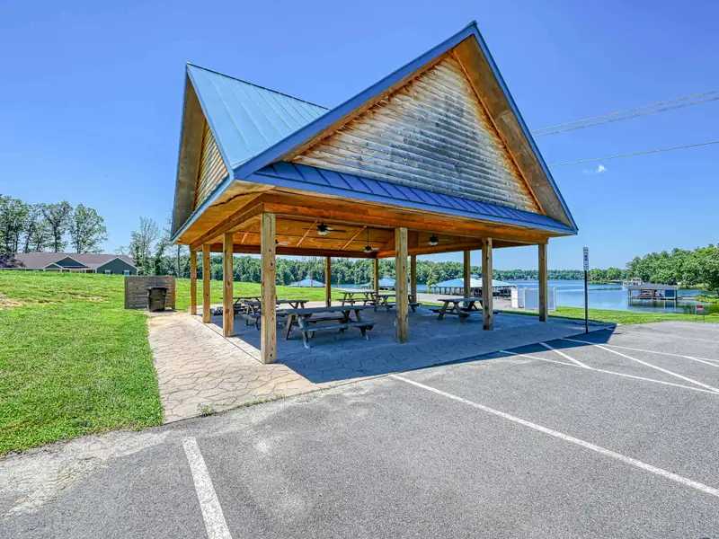 Elk Creek Landing Gazebo - The community gazebo and boat ramp area sit right on the cove, with picnic tables shaded by the metal-roofed pavilion.
