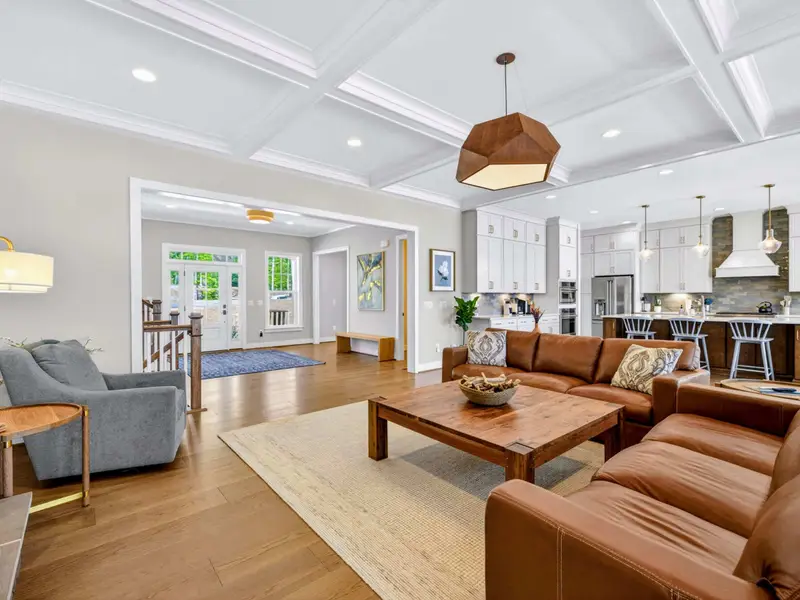 Great Room - Views start from the front door and carry through the great room to the island kitchen beyond.