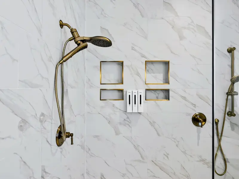 Primary Bath - Rainfall and handheld fixtures with tiled niches in the walk-in shower.