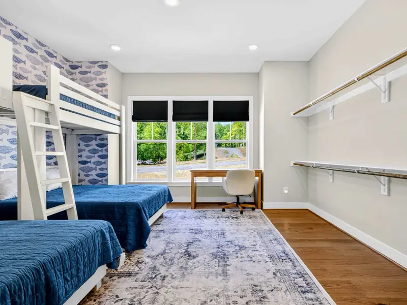 Bunk Room - Bunks, a soft rug, and blackout blinds make a fun, restful retreat.