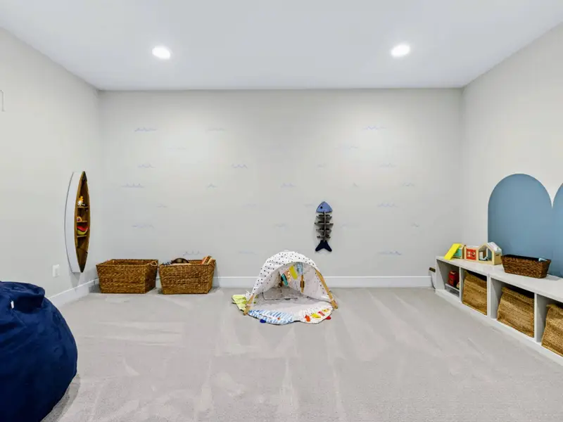 Game Room - A full arcade and game lineup with walkout access to the patio, plus toys for all ages in the playroom.