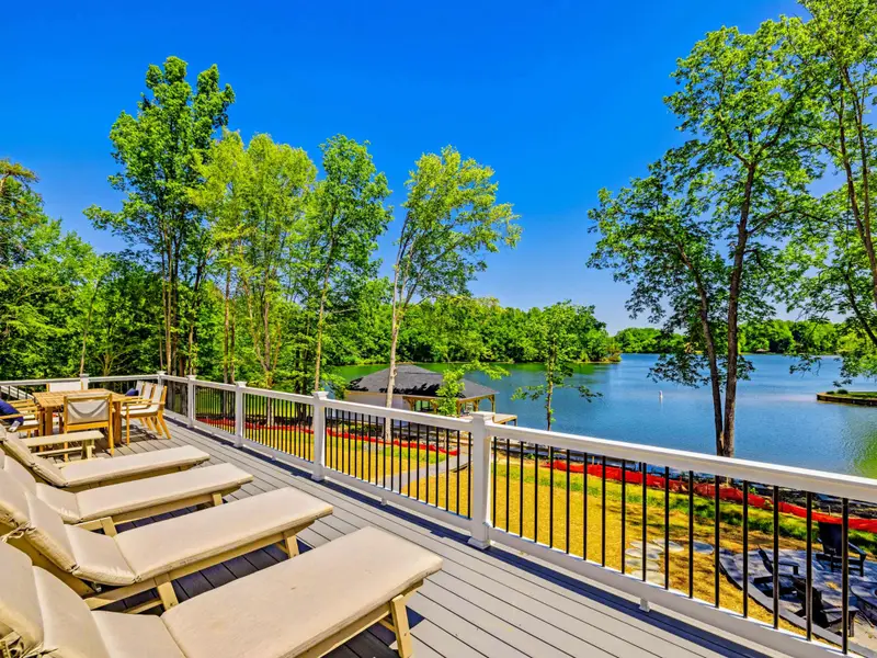 Sun Deck - A row of loungers along the open deck rail soaks up the afternoon sun.